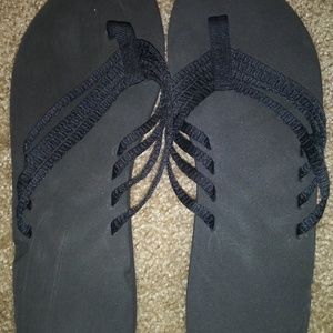 Womens black flip flops. Size 10